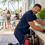 Jacksonville plumber checking a sink before a sunny holiday weekend cookout at a Florida home